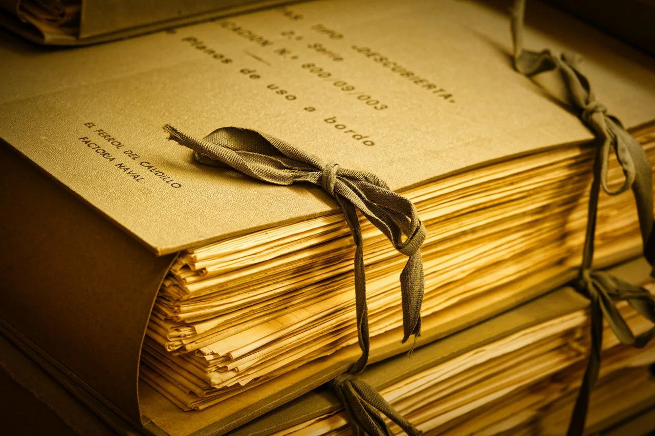 Vintage documents tied with ribbon in an archive