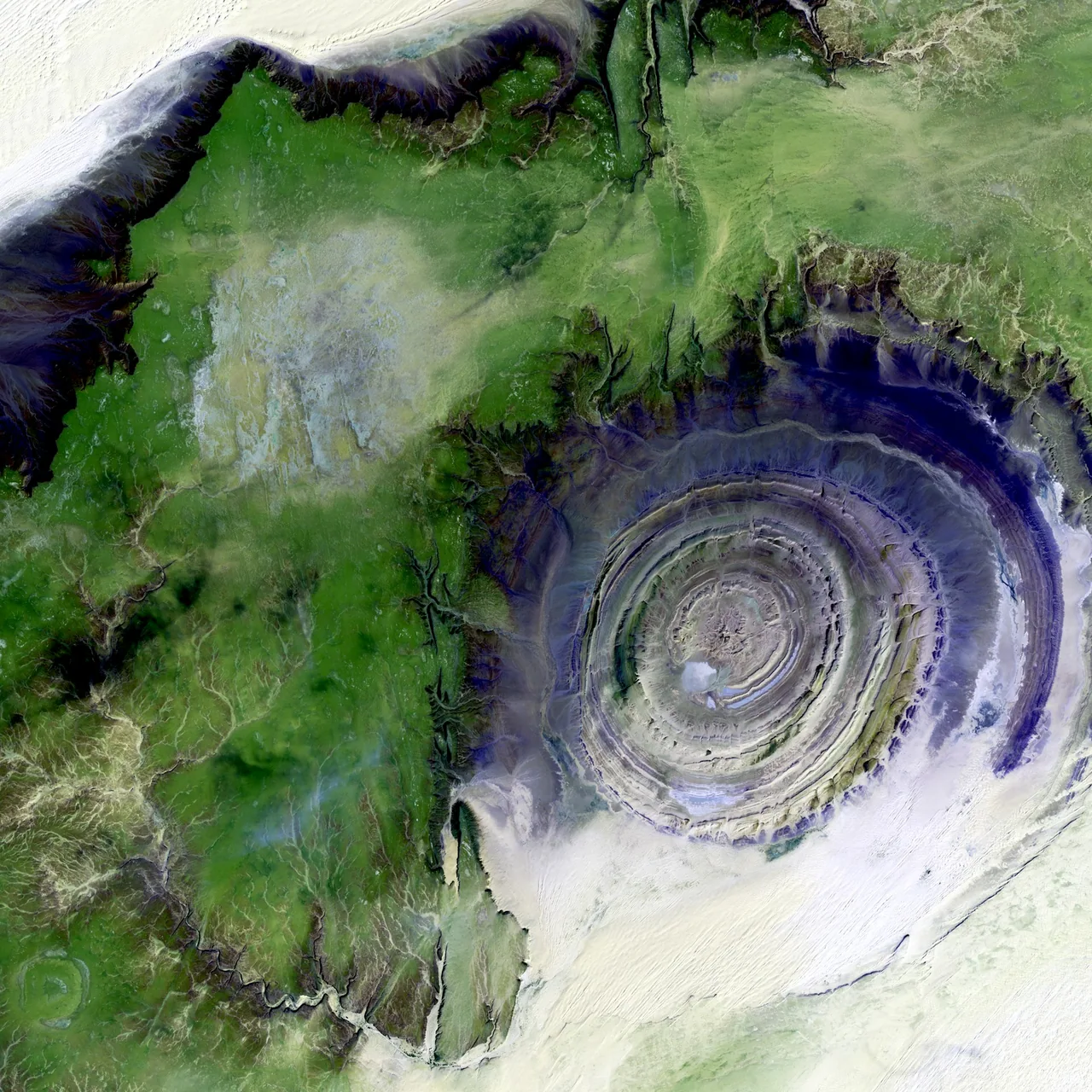 Satellite view of desert geological formations.