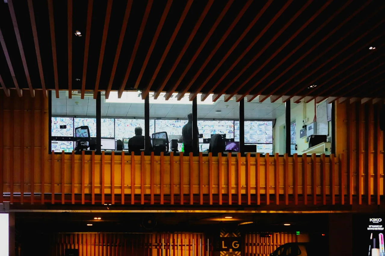 Control room operators working at computer monitors